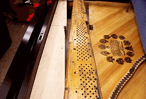 1929 Steinway. View shows old pin block (right) next to the new fiited one (left) and a new Steinway soundboard decal. Next steps are to install the harp(plate), drill the block and string.
